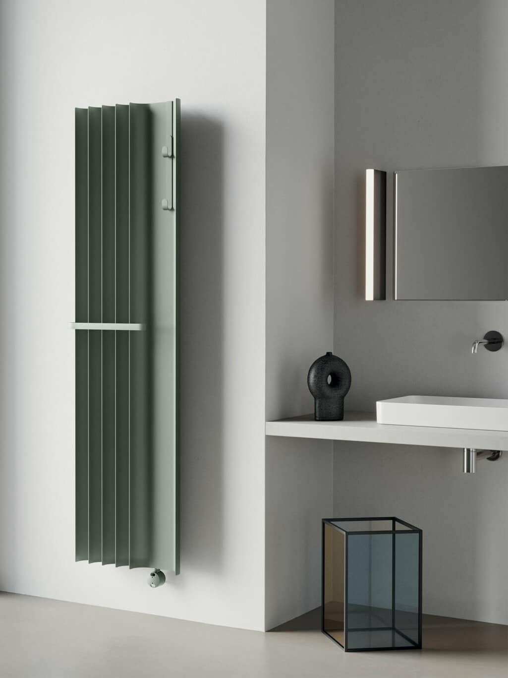 radiatore design verde con barra portasalviette