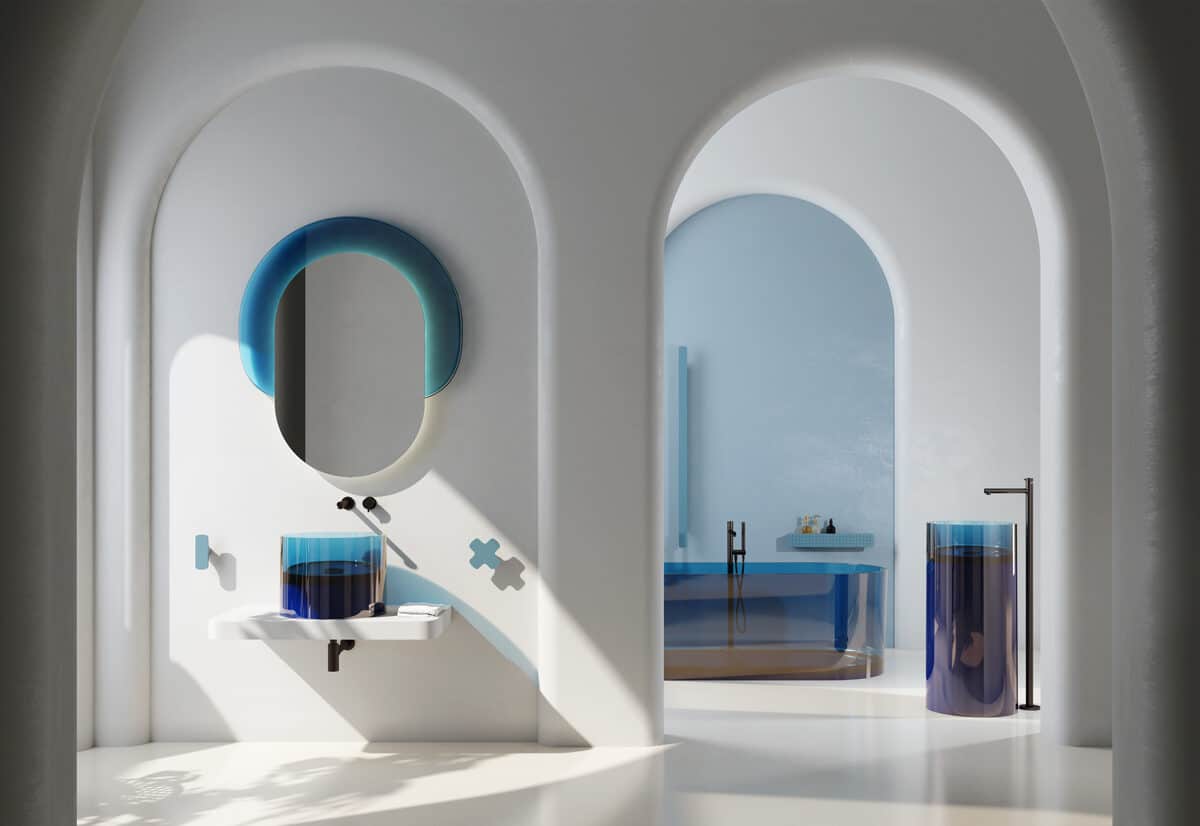 bagno moderno con lavabo e vasca in resina blu trasparente lucida